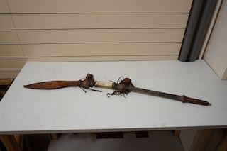 A quantity of African tribal spears swords and tools. Condition - varies